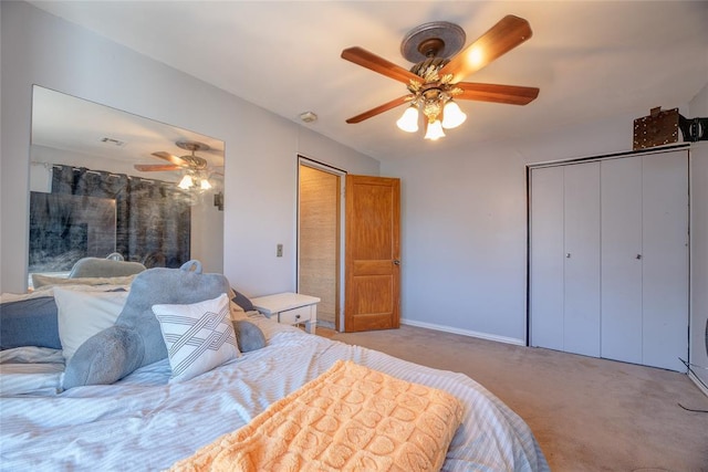 carpeted bedroom with ceiling fan