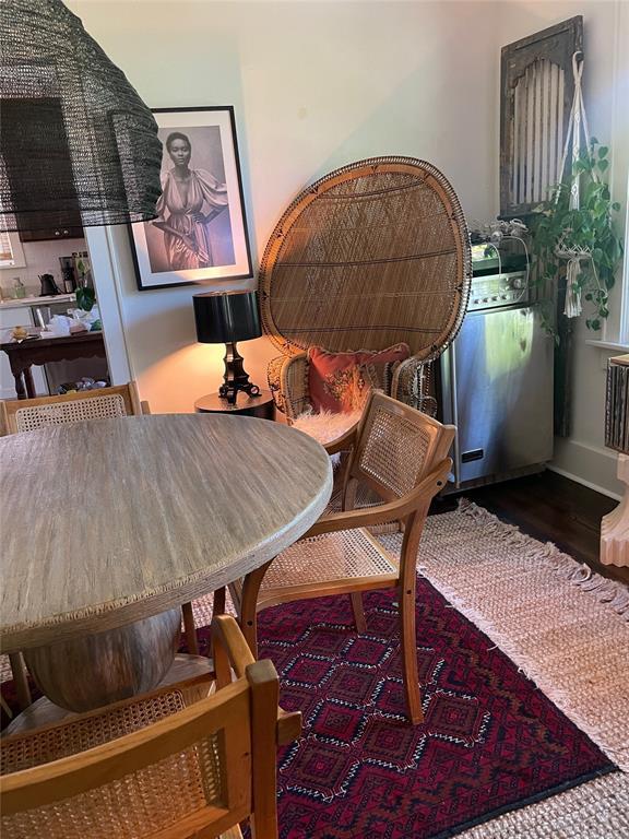 sitting room featuring dark hardwood / wood-style floors