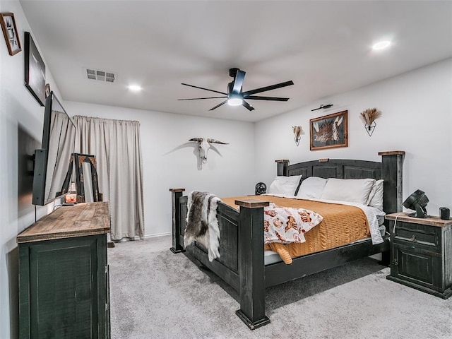 carpeted bedroom featuring ceiling fan