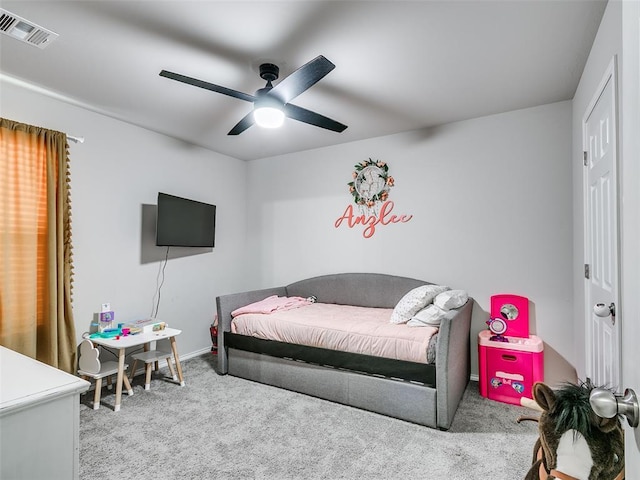 carpeted bedroom with ceiling fan