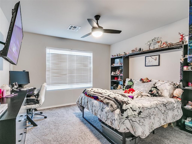 carpeted bedroom with ceiling fan