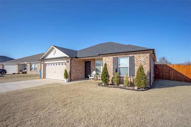 ranch-style house featuring a garage