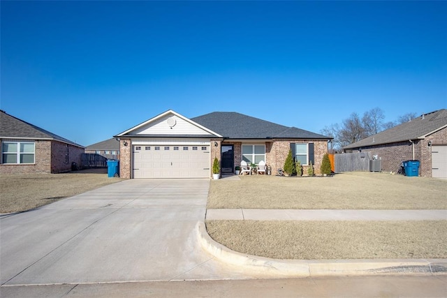 single story home featuring a garage