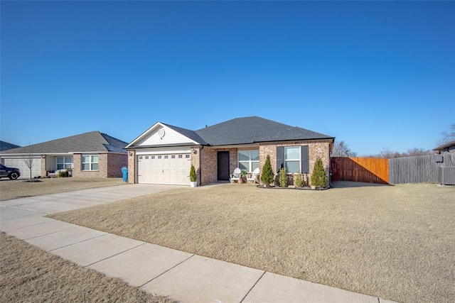 ranch-style house featuring a garage