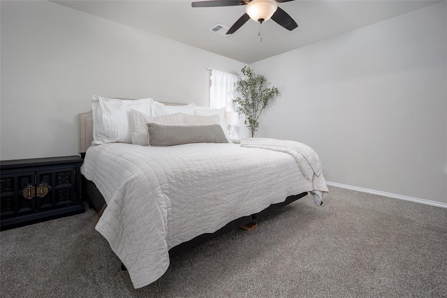 bedroom featuring dark colored carpet and ceiling fan