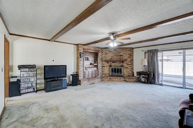 living room with a textured ceiling, light colored carpet, a fireplace, and beam ceiling