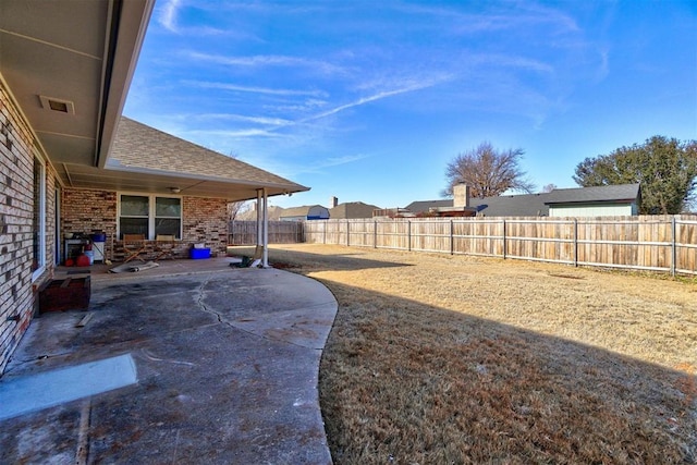 view of yard with a patio area