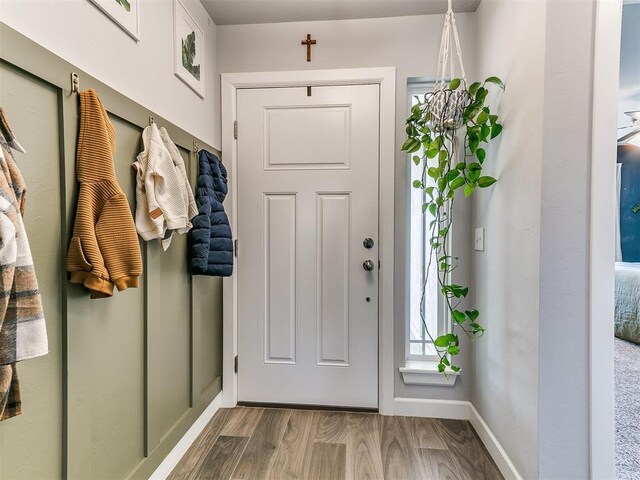 mudroom featuring wood-type flooring