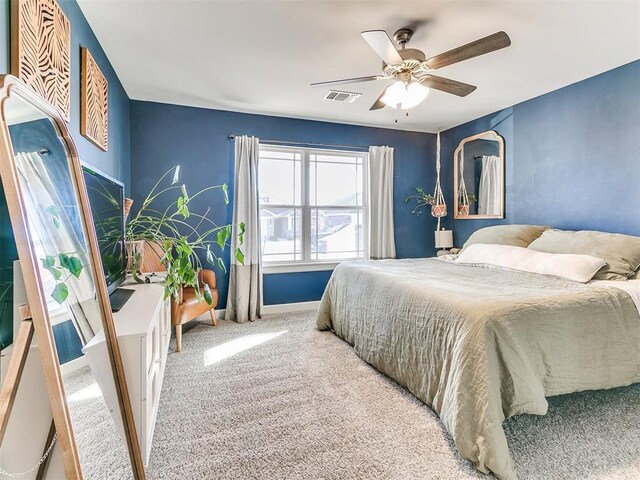 bedroom featuring ceiling fan and carpet floors