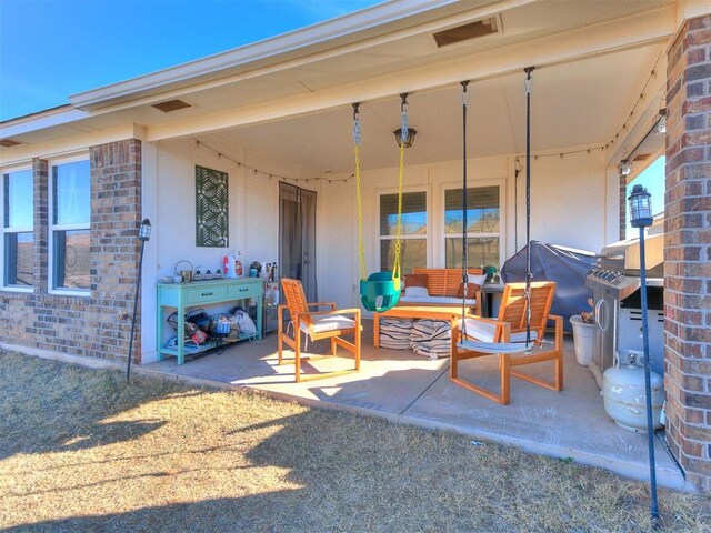 view of patio / terrace featuring outdoor lounge area and area for grilling