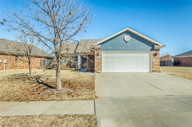 ranch-style home featuring a garage