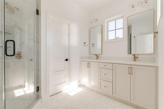 bathroom featuring double vanity, a sink, and a marble finish shower