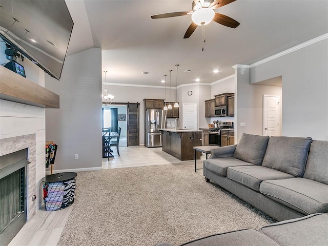 living room with light carpet, ceiling fan with notable chandelier, crown molding, and sink