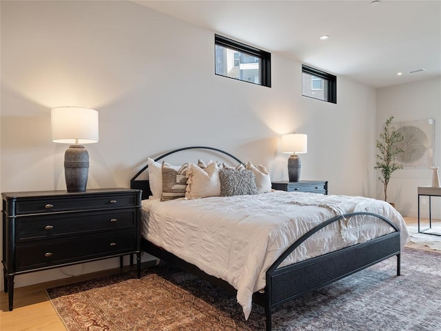 bedroom with light hardwood / wood-style flooring