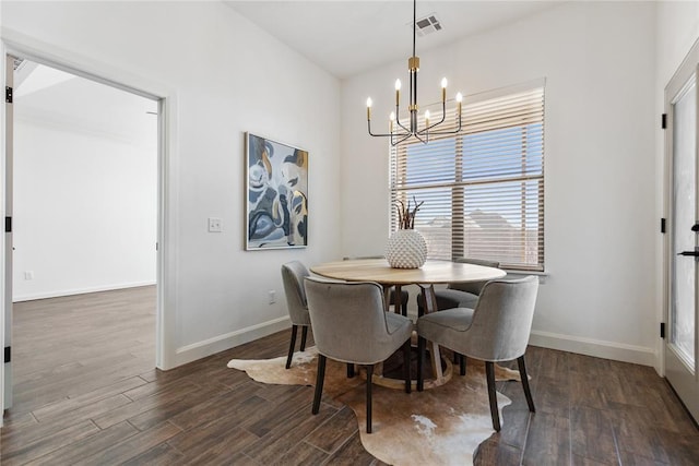 14704 Ashore Dr, Oklahoma City, OK 73142 - dining space with dark wood-type flooring, baseboards, visible vents, and an inviting chandelier