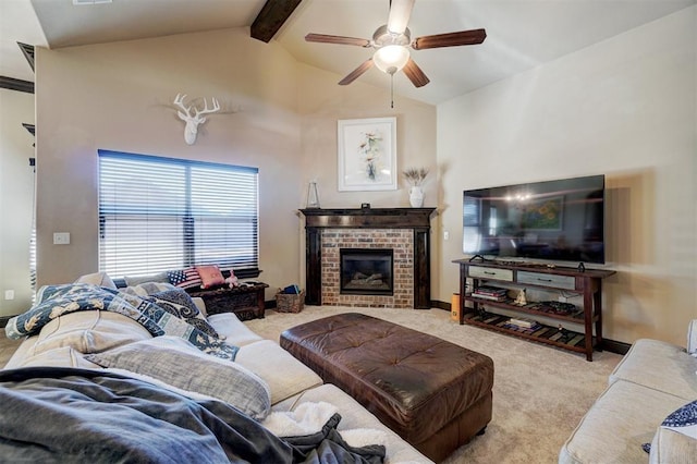 living room with light colored carpet, a fireplace, vaulted ceiling with beams, and ceiling fan