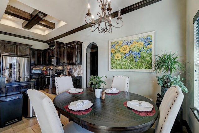 tiled dining room featuring a notable chandelier, beamed ceiling, coffered ceiling, and ornamental molding