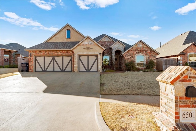 view of front of property featuring a garage