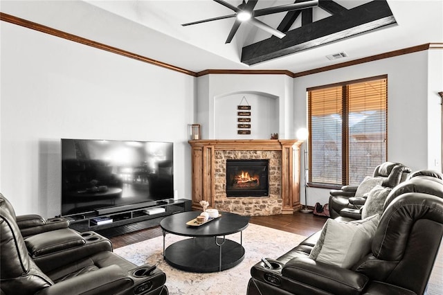 living room with vaulted ceiling, ceiling fan, a fireplace, and hardwood / wood-style floors