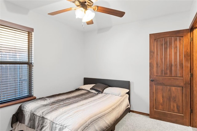 bedroom with carpet floors and ceiling fan