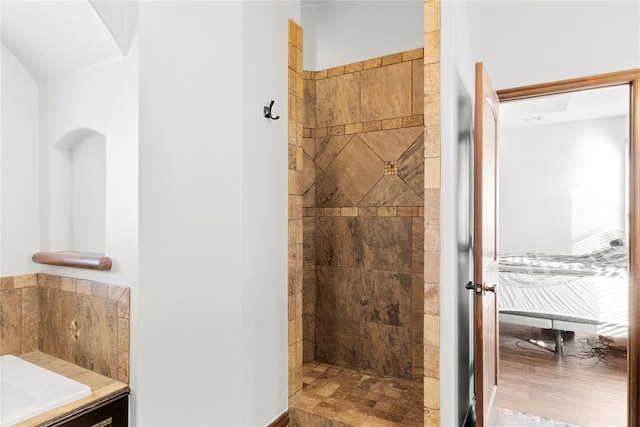 bathroom featuring tiled shower