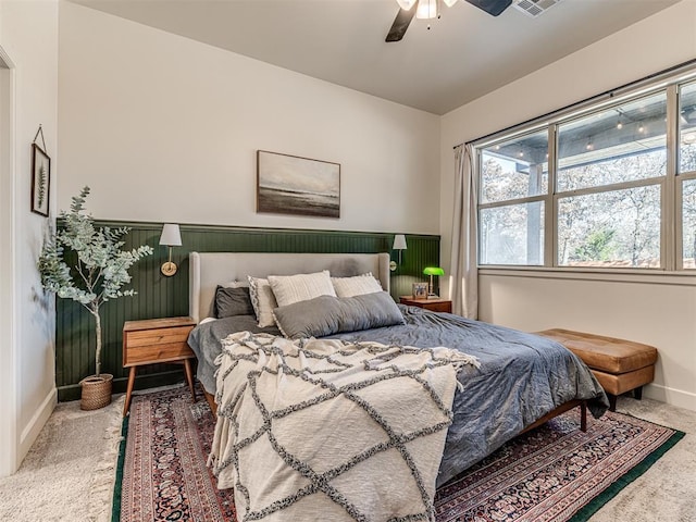 carpeted bedroom featuring ceiling fan