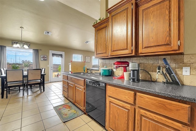 kitchen with dishwasher, backsplash, sink, light tile patterned flooring, and a chandelier