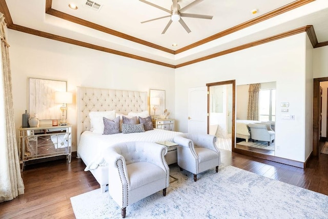 bedroom with ceiling fan, dark hardwood / wood-style flooring, and crown molding