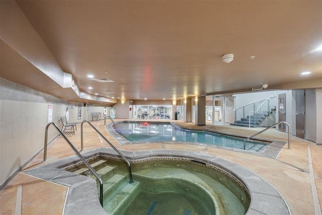 view of pool featuring an indoor in ground hot tub