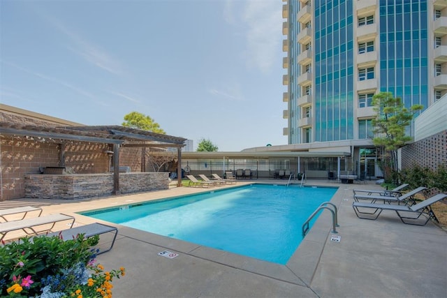 view of swimming pool featuring a patio