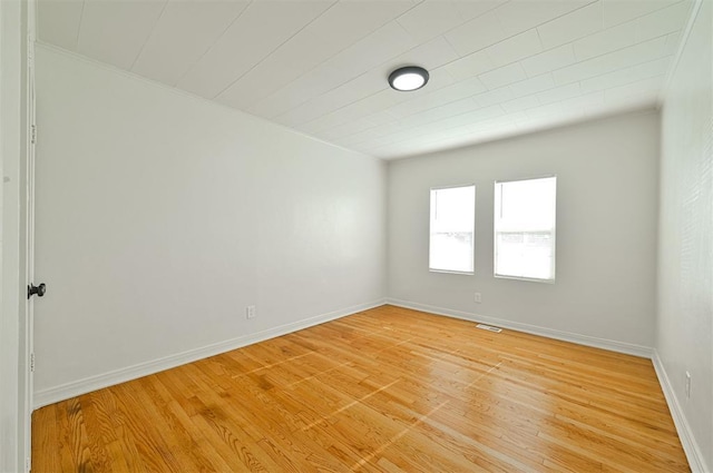 empty room featuring hardwood / wood-style floors