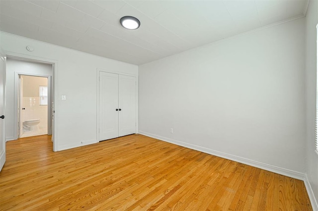 unfurnished bedroom featuring light hardwood / wood-style floors