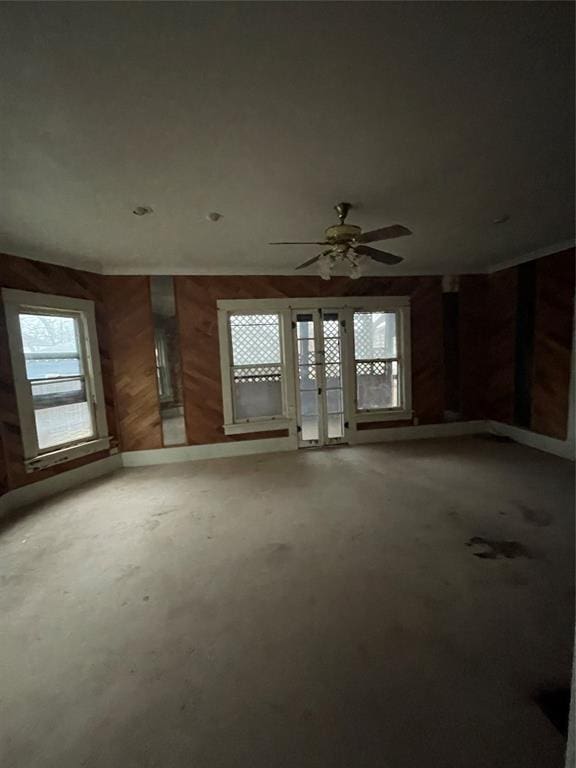 unfurnished room featuring ceiling fan