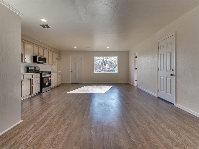 unfurnished living room featuring wood-type flooring