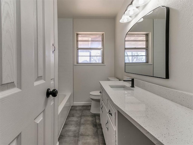 full bathroom with washtub / shower combination, vanity, and toilet