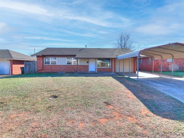 ranch-style house featuring a carport and a front yard