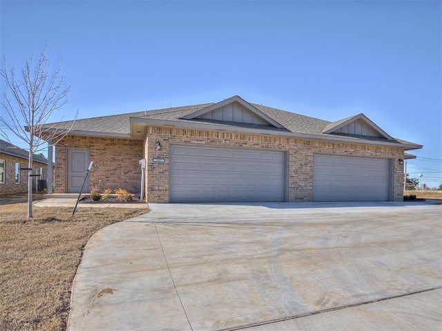 single story home featuring a garage