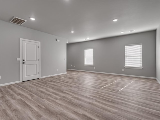 empty room featuring light hardwood / wood-style floors