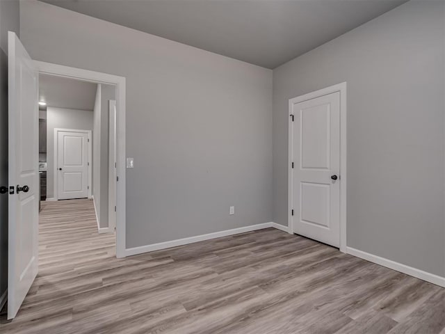 empty room featuring light hardwood / wood-style floors