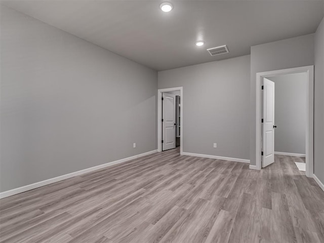 empty room featuring light hardwood / wood-style flooring