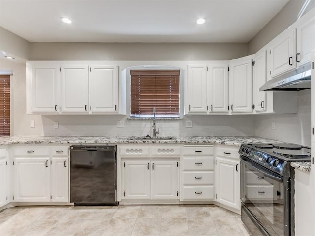 kitchen featuring white cabinetry, light stone countertops, and black appliances