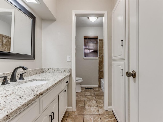 full bathroom featuring vanity, shower / tub combination, tile patterned floors, and toilet