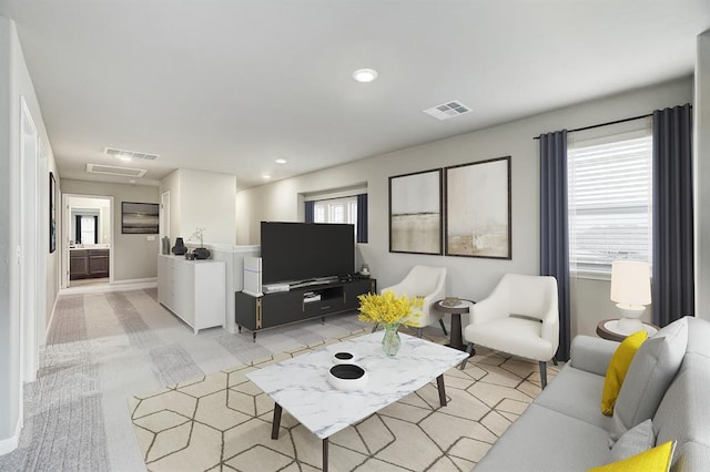 living room with light colored carpet