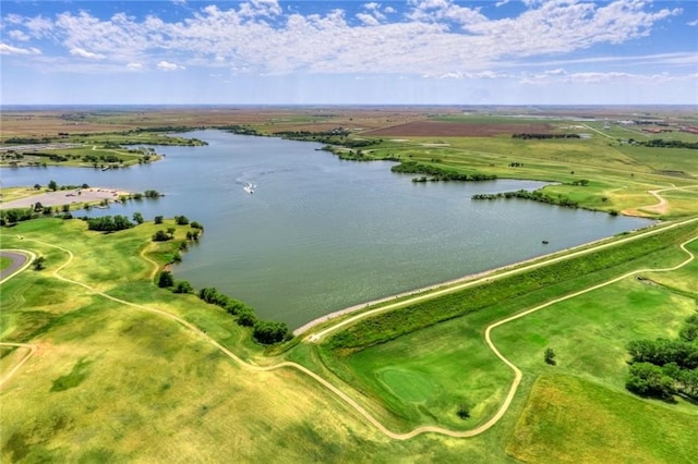 birds eye view of property featuring a water view and a rural view