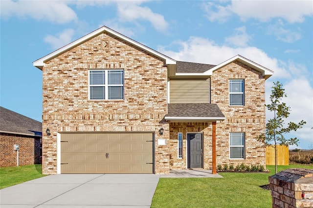 view of front property featuring a garage and a front yard