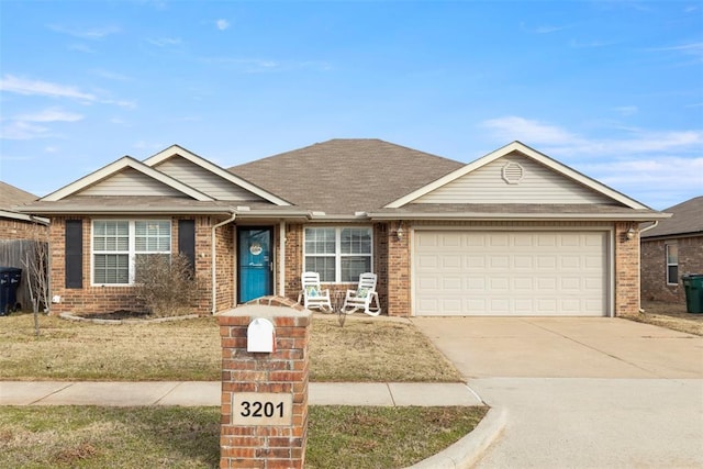 single story home featuring a garage