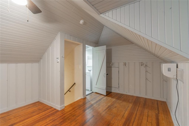 bonus room with ceiling fan, lofted ceiling, and wood-type flooring