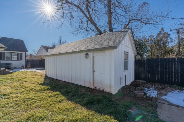 view of outdoor structure with a yard