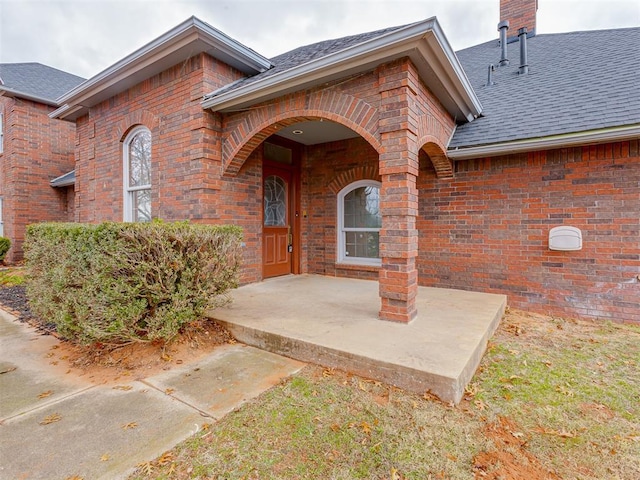 doorway to property featuring a patio area