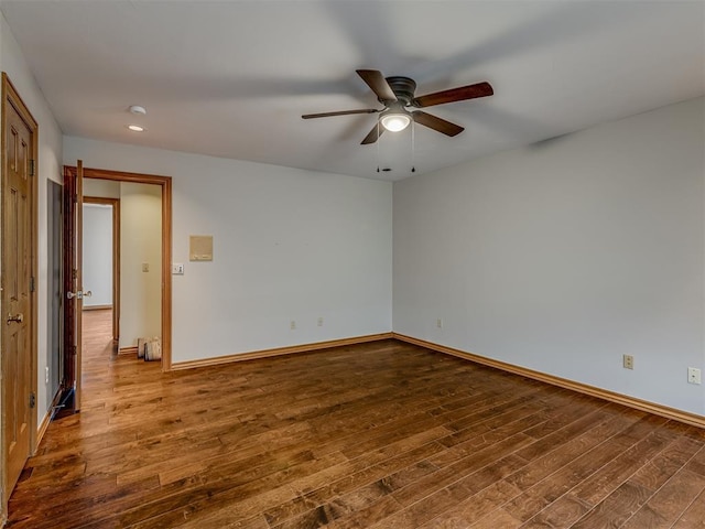 unfurnished room featuring hardwood / wood-style floors and ceiling fan